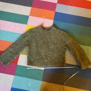 green wool sweater